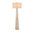 Birdsong Whitewash Floor Lamp turned on with warm light illuminating woven hyacinth shade and base