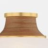Close-up of the aged brass canopy and hand-wrapped rattan texture detail of Pearl River flush mount light