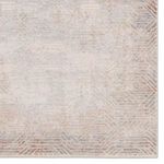 Detailed view of geometric border with rust accents and textural contrast