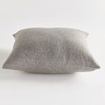 Flat side profile of pillow showing its plump rectangular shape