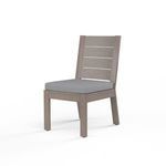 Laguna Armless Dining Chair with hand-brushed aluminum frame mimicking driftwood and gray seat cushion