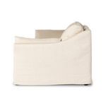 Side profile view highlighting plush cushioning and arm height on sectional