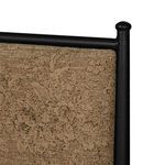 Close-up of upper bed frame corner showing rounded ball top on tapered black iron post