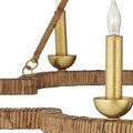 Savoie Chandelier captured head-on showing dozen candle lights and scalloped natural rattan frame
