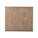 Close-up of lower cabinet door panels made of drifted oak wood with framed edges