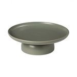Artichoke green footed plate with a smooth matte stoneware finish and wide flat surface