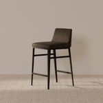 Baron Stool displayed in a neutral indoor setting on textured carpet with soft wall background