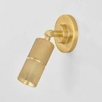 Truett Wall Sconce angled slightly downward from side with visible hinge joint detail in aged brass finish