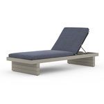 Leroy Outdoor Chaise in weathered grey finish with adjustable backrest and dark blue cushioned seat