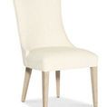 Westwood Upholstered Winged Back Chair with cream performance fabric, curved back, and polished limestone oak legs