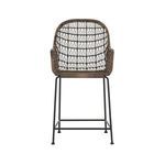 Rear view of Bandera Bar Stool focusing on woven wicker backrest and metal frame base