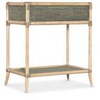Side view showing the rattan wrapped corners and tapered legs of the bedside table