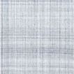 Light slate handmade area rug with geometric grid pattern, low pile, and soft textured appearance