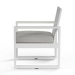 Side view showing Newport Dining Chair’s thick grey cushion and square arm frame