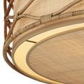 Detailed corner view of woven rattan and grasscloth diffuser edge with warm illumination