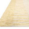 Edge of Santa Fe Rug showing thickness and flatlay on wood floor