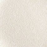 Close-up of soft boucle upholstery in cream with visible stitching along edge