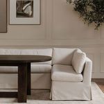 Banquette assembled as part of a modular dining corner seating arrangement with wood table