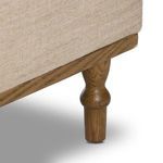 Close-up of turned oak leg without caster showing wood grain and shape