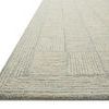 Low angle shot showing thickness and hooked wool texture on edge of Francis Silver / Sky Rug