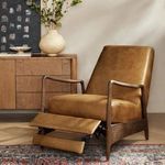 Back view of olive green leather recliner with dark wood frame and vertical seam details
