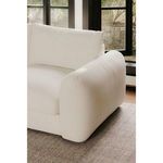 View of Berga sectional arm and back cushions next to window with natural lighting