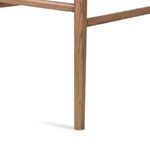 Detailed view of the lower leg and wood grain in natural smoked oak finish