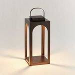 Tall rectangular bronze outdoor solar LED lantern with arched cutouts and a top handle