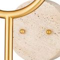 Close-up of travertine wall mount textured surface and two small brass fastening brads on Highsmith Wall Sconce