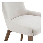 Close-up of upholstery texture and padded corner detail on Posta dining chair's seat and back