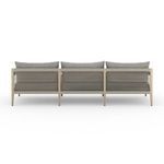 Rear view showing cotton weaving detail of sofa back and teak frame structure