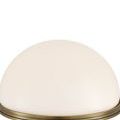 Close-up of white glass dome shade with smooth glossy surface and brass rim
