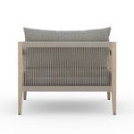 Back view displaying the vertical rope detailing across the entire rear frame of the chair