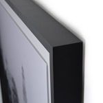 Close-up detail of the frame thickness and edge with matte texture