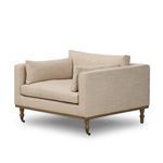 Harlin Chair angled view showing low profile arms and back cushions from front corner