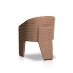 Rear angled view of chair highlighting woven wicker back and leg kickback detail