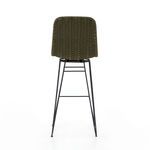 Rear view of stool highlighting woven green rope seat back and black legs