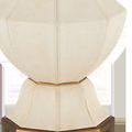 Close-up of textured faux leather hexagonal base with antique brass ring and black bottom edge