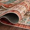Curled edge close-up highlighting backing and smooth low pile of Zion Red / Multi Rug