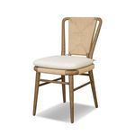 Greylin Dining Chair angled view showing chair's rounded wood legs and woven seat side