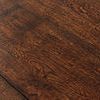 Close-up of the rustic oak wood grain texture on tabletop surface