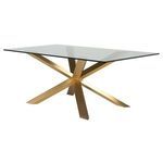 Couture Dining Table with clear rectangular glass top and gold metal base featuring intersecting angled legs