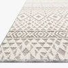 Angled close-up showing textured pile contrasts and edge binding in silver and ivory tones