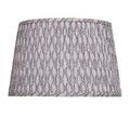 Close-up angled view of illuminated Plume shade highlighting texture and fan-like pattern