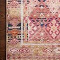 Close-up of the corner and woven details of the Layla Magenta Multi Rug on a hardwood floor