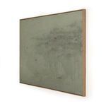 Angled side view showing the depth of the thin wooden frame around the green and gray textured painting
