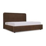 Simon Storage Bed angled view showing rounded headboard and low footboard sides in brown upholstery