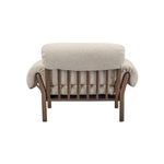 Back view displaying spindle back and wooden frame of Cardero lounge chair