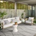 Devon Blush / Natural Pillows styled on a white sofa with matching neutral decor in a modern indoor-outdoor living room