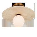 Apricity Semi-Flush Mount viewed from below showing round travertine disc and central globe